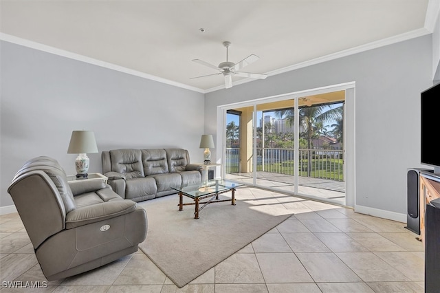 living room with crown molding, light tile patterned floors, and ceiling fan