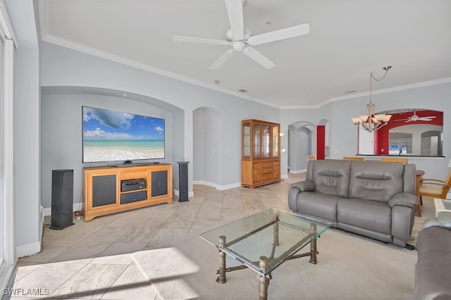 living room with crown molding and ceiling fan with notable chandelier