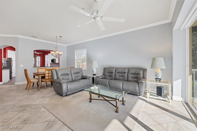 living room with ornamental molding and ceiling fan with notable chandelier