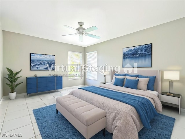 bedroom featuring tile patterned floors and ceiling fan