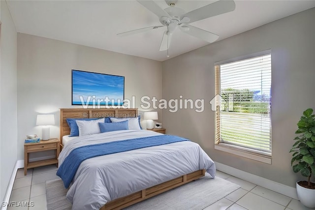 tiled bedroom with ceiling fan