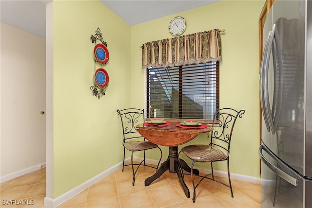 dining room featuring light tile patterned floors