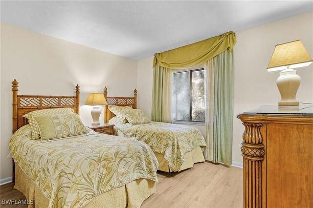 bedroom featuring light hardwood / wood-style floors