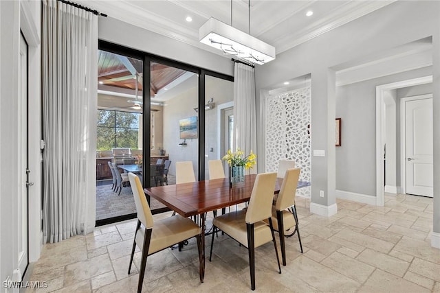 dining space with crown molding