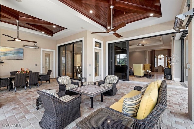 view of patio featuring outdoor lounge area and ceiling fan