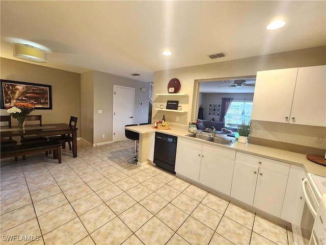 kitchen featuring white cabinetry, black dishwasher, sink, kitchen peninsula, and stove