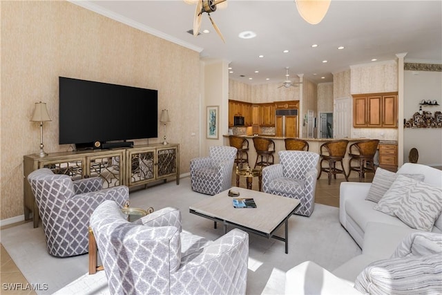 tiled living room with crown molding and a notable chandelier