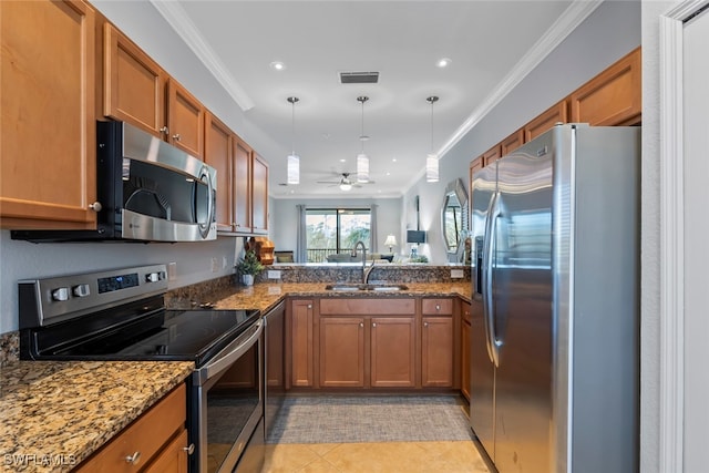 kitchen with ceiling fan, sink, crown molding, light tile patterned flooring, and appliances with stainless steel finishes