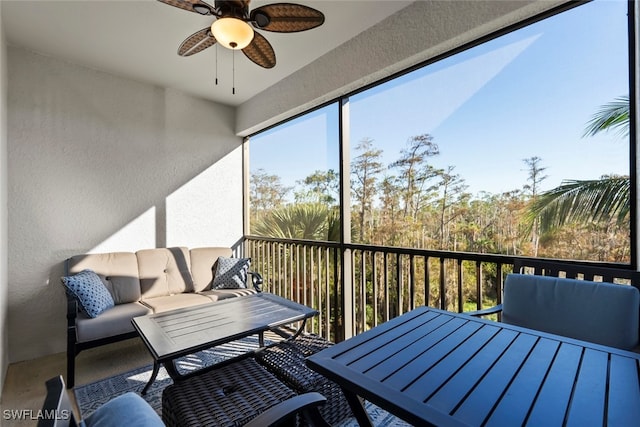 sunroom / solarium with ceiling fan