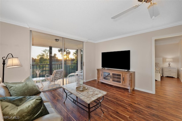 living room with crown molding, ceiling fan, and dark hardwood / wood-style flooring