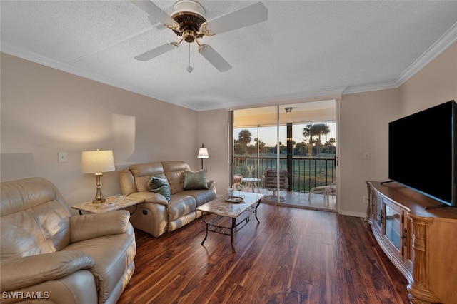 living room featuring crown molding, dark wood-type flooring, a textured ceiling, and ceiling fan