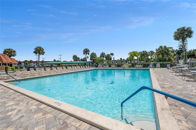 view of swimming pool featuring a patio