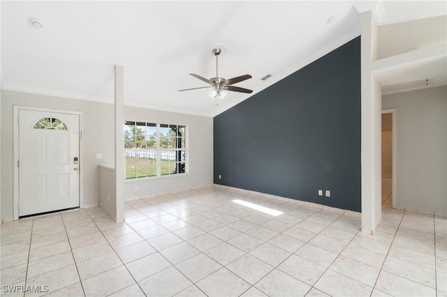 foyer with light tile patterned floors, visible vents, a ceiling fan, lofted ceiling, and ornamental molding