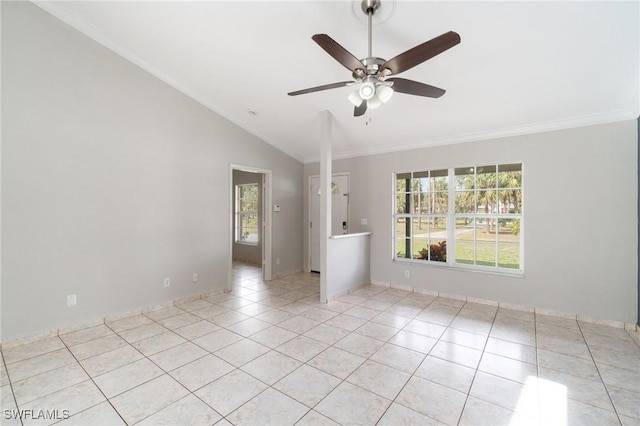 empty room with light tile patterned floors, a ceiling fan, baseboards, vaulted ceiling, and ornamental molding