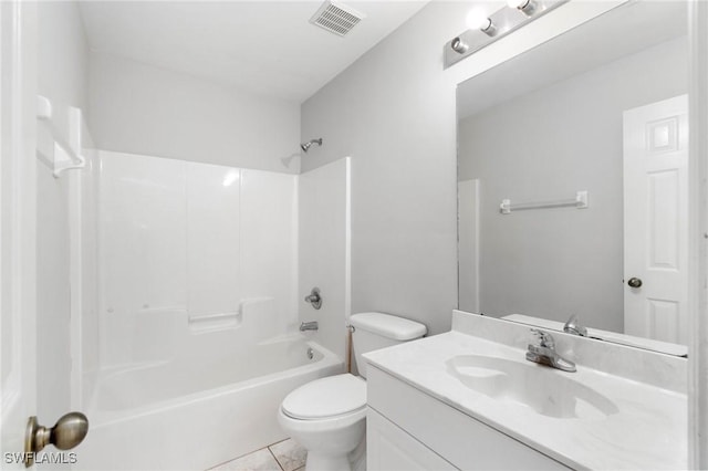 bathroom with toilet, vanity, visible vents, and shower / bathtub combination