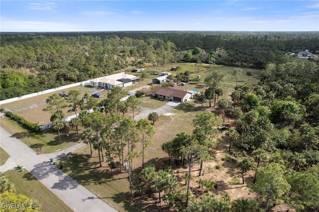 aerial view featuring a forest view