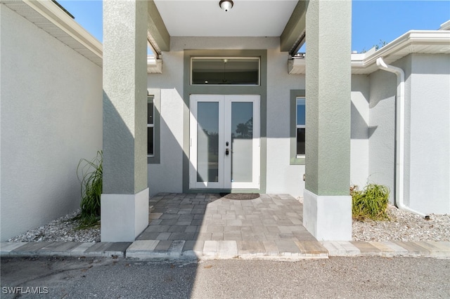 doorway to property with french doors