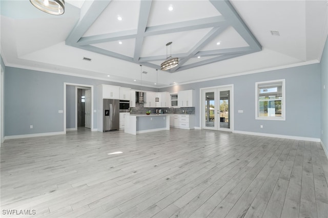 unfurnished living room featuring light hardwood / wood-style floors, coffered ceiling, ornamental molding, and beam ceiling