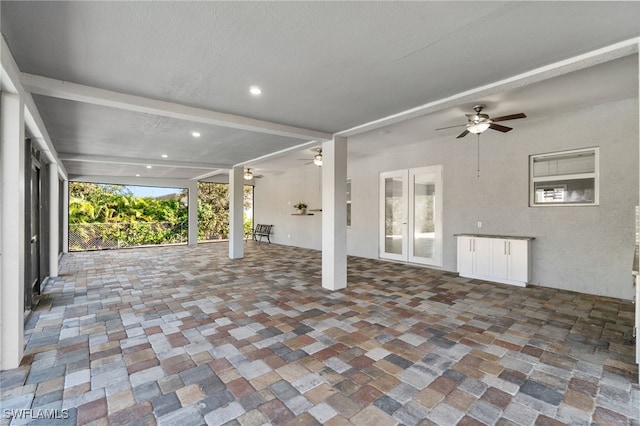 view of patio / terrace with ceiling fan and french doors