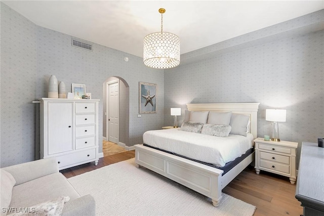 bedroom featuring wood-type flooring