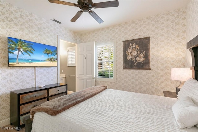 bedroom featuring connected bathroom and ceiling fan