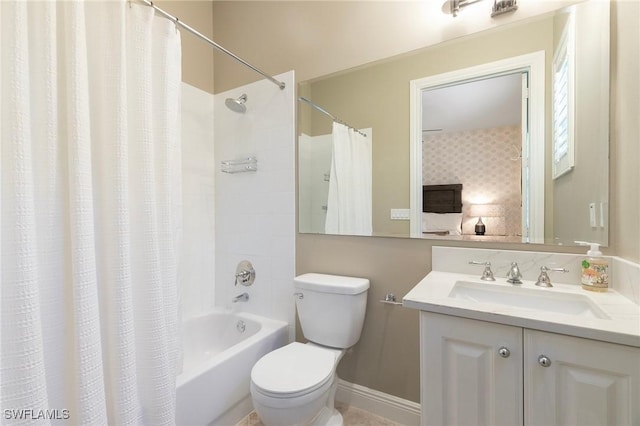 full bathroom featuring shower / bath combination with curtain, vanity, and toilet