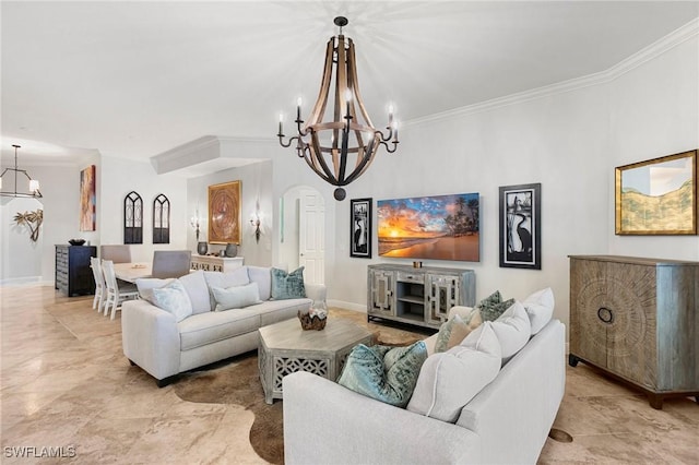 living room featuring crown molding and a chandelier