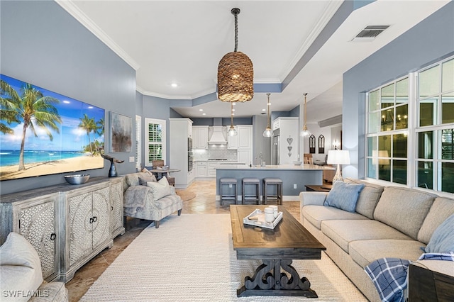 tiled living room with crown molding