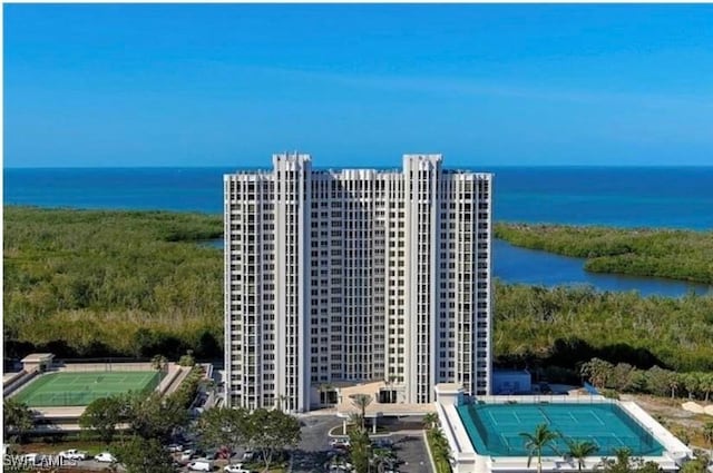 birds eye view of property featuring a water view