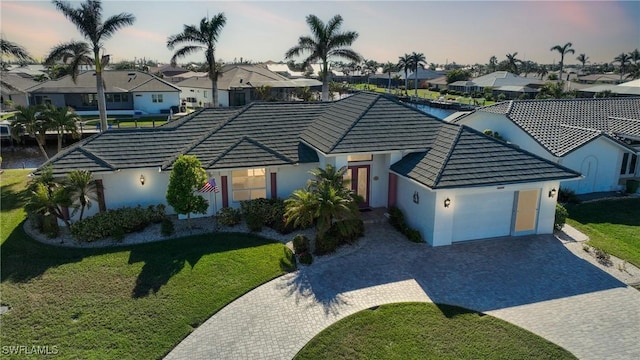 view of front of house with a lawn