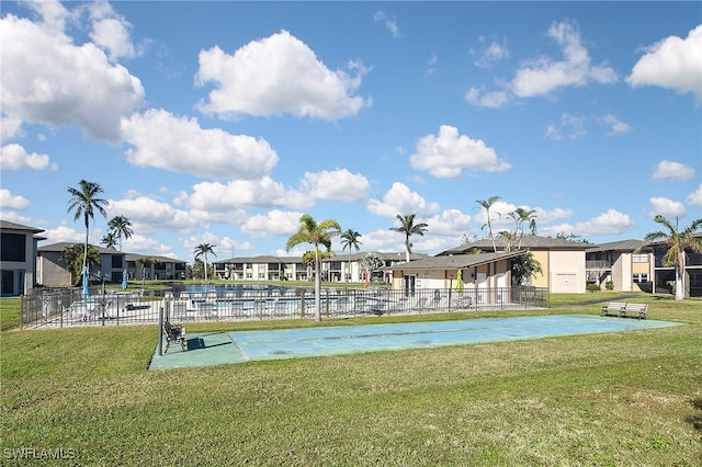 surrounding community featuring a lawn