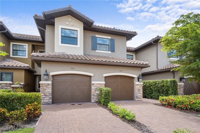 view of front of home featuring a garage