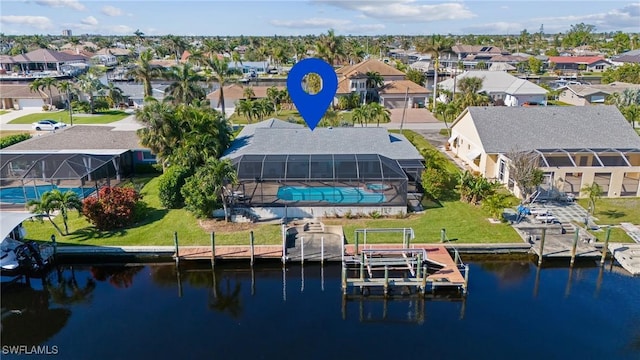 bird's eye view with a water view