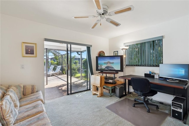 office area with carpet floors and ceiling fan