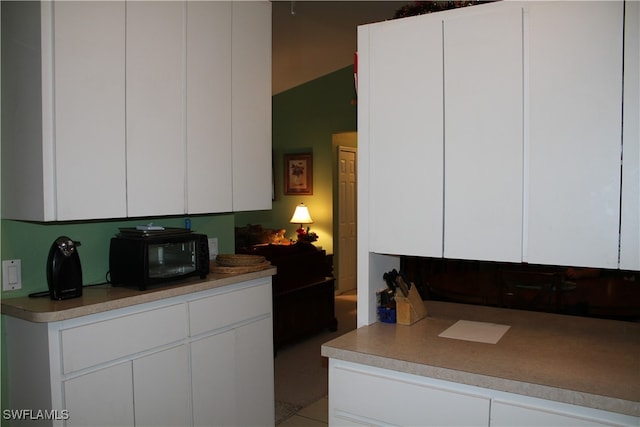 kitchen with white cabinetry