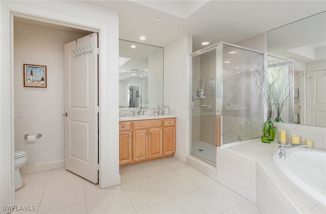 full bathroom with tile patterned floors, vanity, plus walk in shower, and toilet