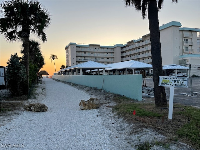 view of outdoor building at dusk