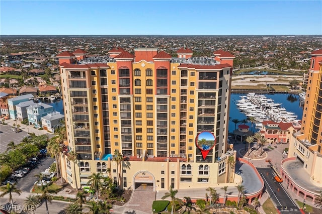 view of building exterior with a water view