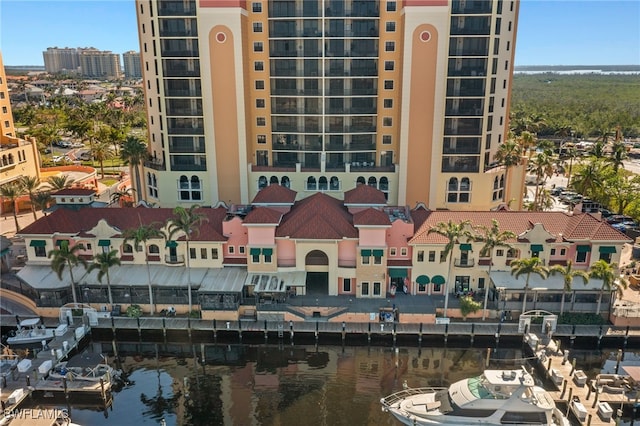 view of building exterior featuring a water view