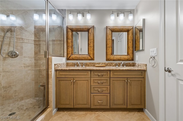 bathroom featuring vanity, tile patterned floors, and walk in shower