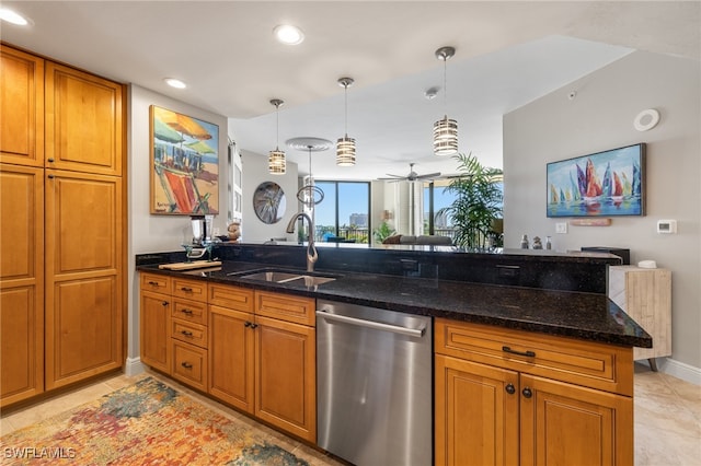 kitchen featuring kitchen peninsula, stainless steel dishwasher, ceiling fan, sink, and dark stone countertops