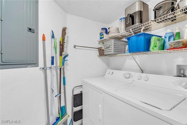 laundry area featuring separate washer and dryer and electric panel