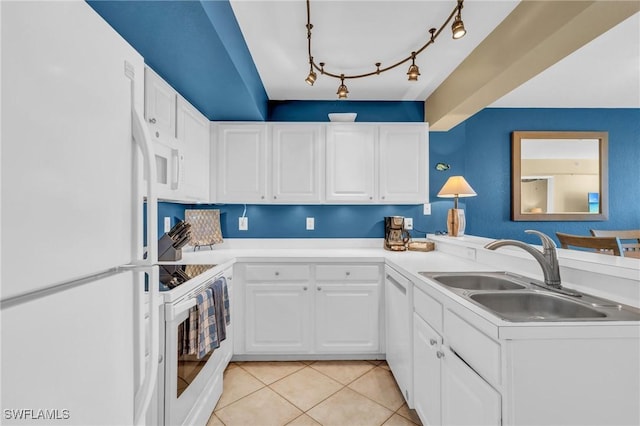 kitchen featuring white cabinetry, sink, track lighting, white appliances, and light tile patterned floors