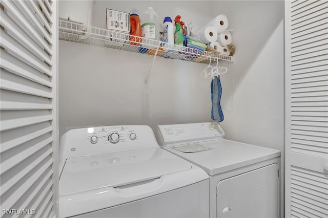 laundry area featuring washing machine and dryer