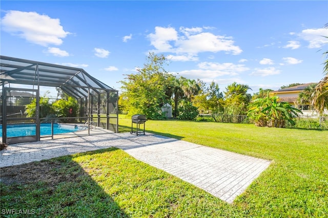 view of yard featuring a patio area and a lanai