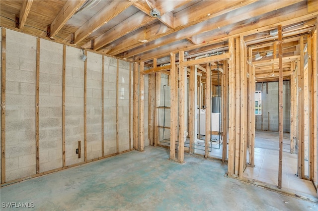 unfinished basement with washer / clothes dryer