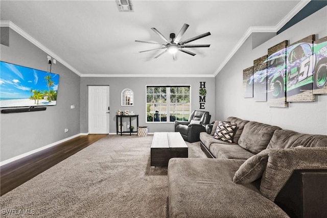 living room featuring lofted ceiling, dark hardwood / wood-style flooring, ceiling fan, and crown molding