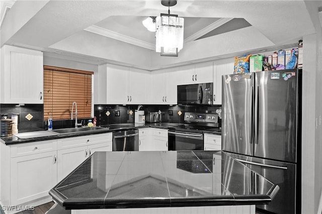 kitchen featuring kitchen peninsula, white cabinetry, sink, and appliances with stainless steel finishes