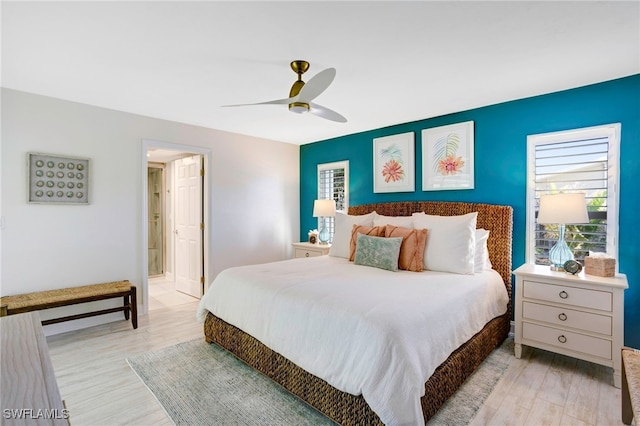 bedroom featuring ceiling fan and light hardwood / wood-style floors