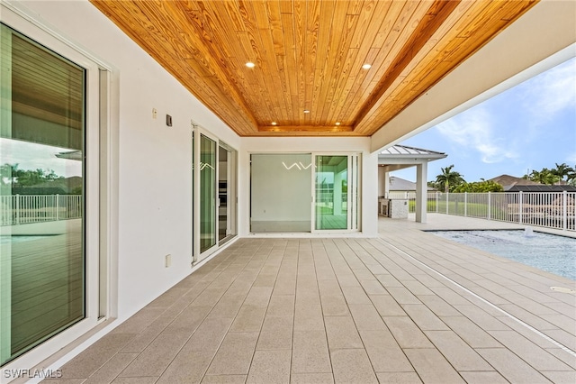 wooden deck featuring a patio